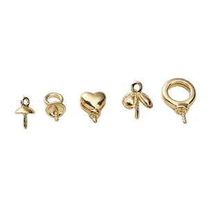Detailed close-up of 14K gold plated earring connectors and pearl cap DIY jewelry findings