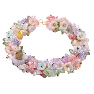 Pearlescent ABS camellia and butterfly beaded necklace with sweet pastel colors and gold clasp