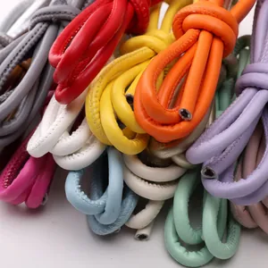 Close-up of colorful 6mm braided faux leather cords with stitched edges for DIY jewelry
