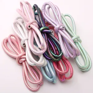 Macro detail of 6mm braided iridescent PU leather cords for DIY jewelry making and crafts