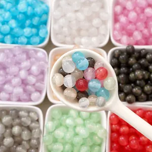 Macro shot of 8-10mm resin glitter round beads in mixed colors for DIY jewelry making