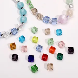 Macro view of colorful 6-8mm crystal glass cube beads for DIY jewelry making crafts