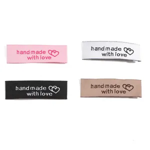 Handmade with love woven fabric labels in pink, white, black and brown colors
