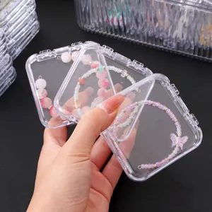 Transparent plastic jewelry storage box set with colorful beaded bracelets and clasps