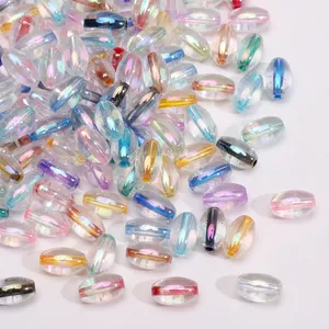 Macro shot of 4x7mm colorful iridescent glass oval beads for DIY jewelry making