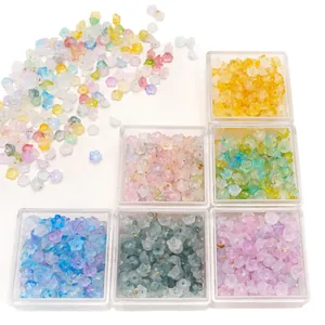 6x3mm acrylic gold-dotted flower beads set in six-grid storage box for DIY crafts