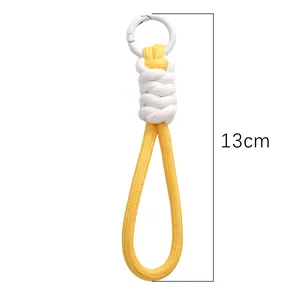 Portachiavi intrecciato giallo e bianco 13 cm in poliestere con moschettone bianco
