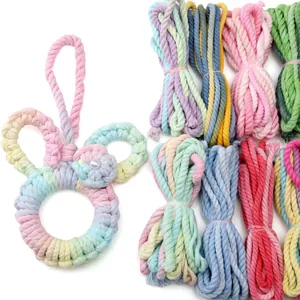 Macro detail of gradient braided cotton cord rabbit ornament with mini pearl flower