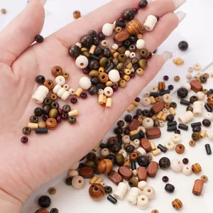 Mélange de perles en bois de formes variées pour création de bijoux DIY naturels