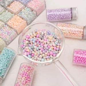 Ciottoli di vetro colorati macaron con cucchiaio per versare e contenitori