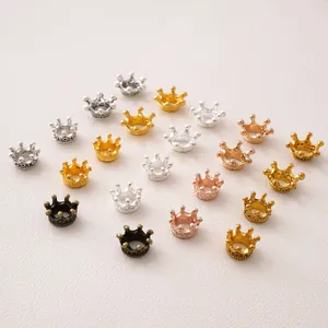 Macro detail of 3D crown alloy beads in various metallic finishes for DIY jewelry making
