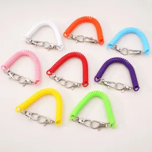 Elastic spiral coil keychain with dual metal lobster clasps in eight vibrant colors