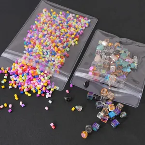 Macro shot of assorted colorful DIY craft beads in transparent PVC self-sealing bags