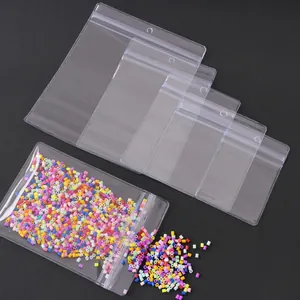 Five assorted sizes of thick transparent PVC ziplock bags with hanging holes for jewelry