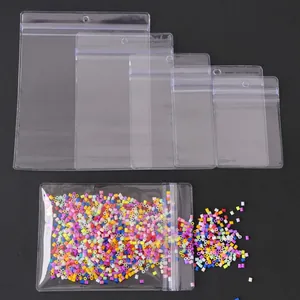 Clear PVC self-sealing jewelry bags in various sizes with hanging holes and zippers