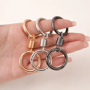 Zinklegierung Schlüsselanhänger mit Doppelring und Feder in Gold, Silber und Schwarz