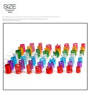 Macro detail of various colorful metal hair rings and braided hair accessories