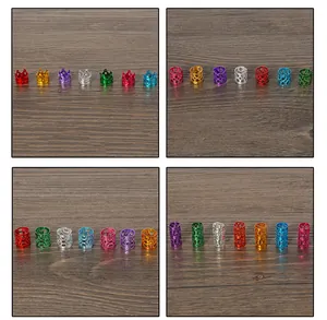 Detail view of colorful aluminum crown beads and hollow filigree cuffs for DIY hair braiding