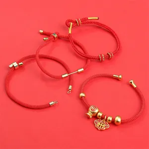 Bracelets corde rouge tressée à la main avec breloques dorées de sac de chance et boulier