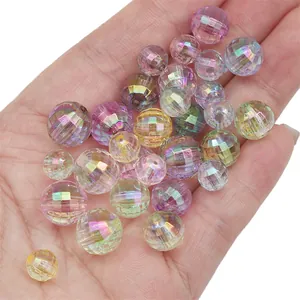 Faceted acrylic iridescent rainbow beads displayed in palm for DIY jewelry making