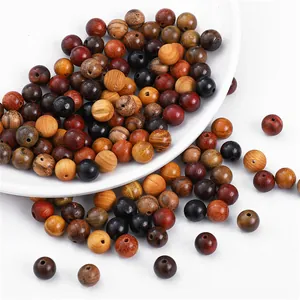 Macro detail of 8mm natural wooden beads with polished texture for DIY jewelry making