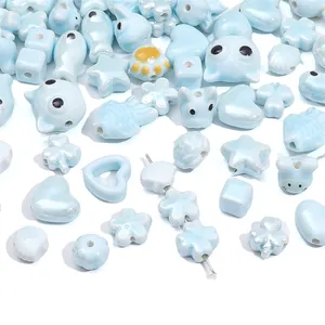 Lot de perles en céramique bleues en forme de cœur et fleur pour bijoux DIY