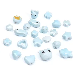Mix of light blue ceramic beads in heart and star shapes for DIY jewelry making