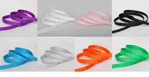 Macro shot of 8 colors grosgrain ribbons with ribbed texture for DIY craft projects