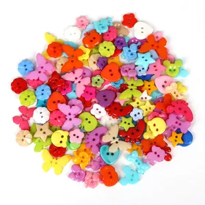 Assorted colorful plastic buttons in butterfly, flower and heart shapes for DIY crafts
