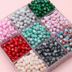 Variety of 8mm marbled glass beads in nine colors for DIY jewelry making and bracelets