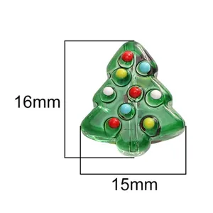Detailed close-up of 16mm green glass Christmas tree bead with colorful hand-painted dots