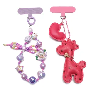 Cute beaded phone charms and leather giraffe pendants with colorful lanyard patches