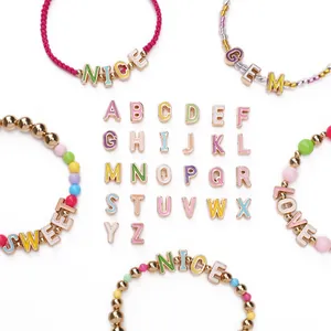Macro view of 10mm alloy enamel letter beads used for DIY handmade jewelry bracelets