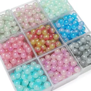 Colorful translucent glass beads in a storage box for DIY jewelry making and bracelets