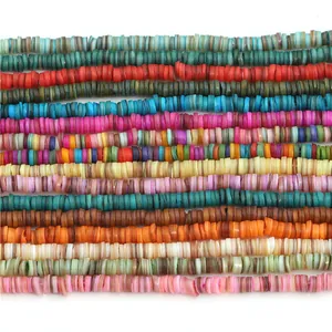 Macro view of colorful 6-8mm flat round Heishi shell beads for DIY jewelry making