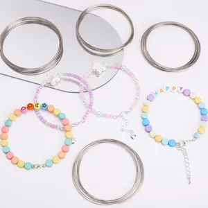 Bobines de fil mémoire 6cm en acier inoxydable pour bracelets avec perles macaron
