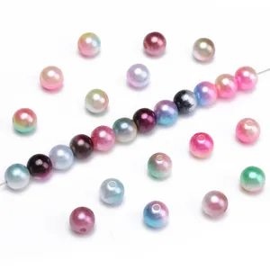 Macro detail of gradient iridescent ABS imitation pearls for DIY jewelry making