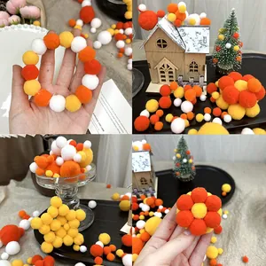 Pompons en peluche orange et jaune pour loisirs créatifs DIY et décorations de fête