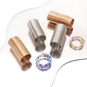 DIY jewelry kit with gold and silver steel wire coils and handmade beaded rings set