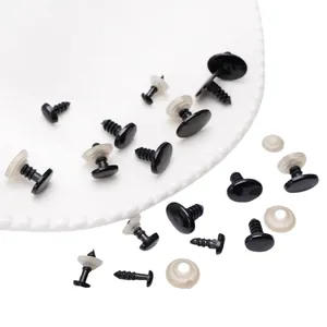 Macro detail of black threaded acrylic safety eyes with washers for DIY doll making