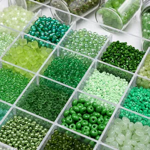 Green glass seed bead kit with various shades and shapes for DIY jewelry making
