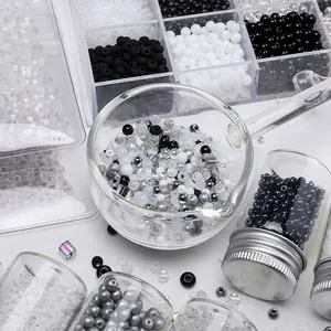 DIY handmade 2-4mm black and white glass seed bead set in various glass containers