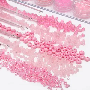 Barbie pink glass seed beads assortment with faceted and matte textures for DIY jewelry