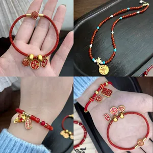 Chinese New Year lucky charm jewelry set featuring red agate beads and golden pendants