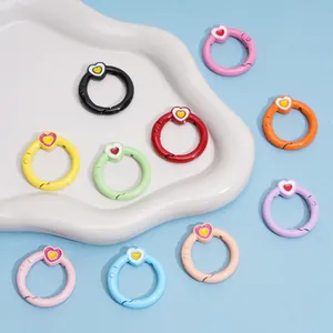 Colorful heart-shaped spring ring carabiners for DIY keychains in various dopamine colors