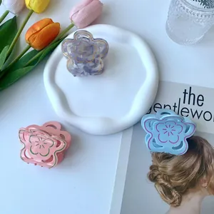 Set di tre mollette per capelli a forma di fiore in acetato in viola rosa e blu
