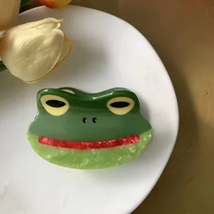 Cute green cartoon frog claw clip made of glossy acetate for thick hair styling