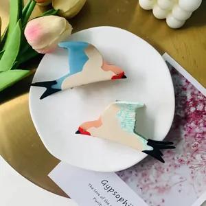 Blue swallow acetate hair claw clips for women with elegant bird shape and tulip decor