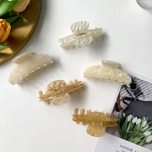 Ensemble de pinces à cheveux élégantes en acétate crème, marbre et ambre pour femme