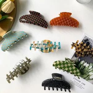 9cm acetate claw clips with checkered patterns and marble textures in various colors